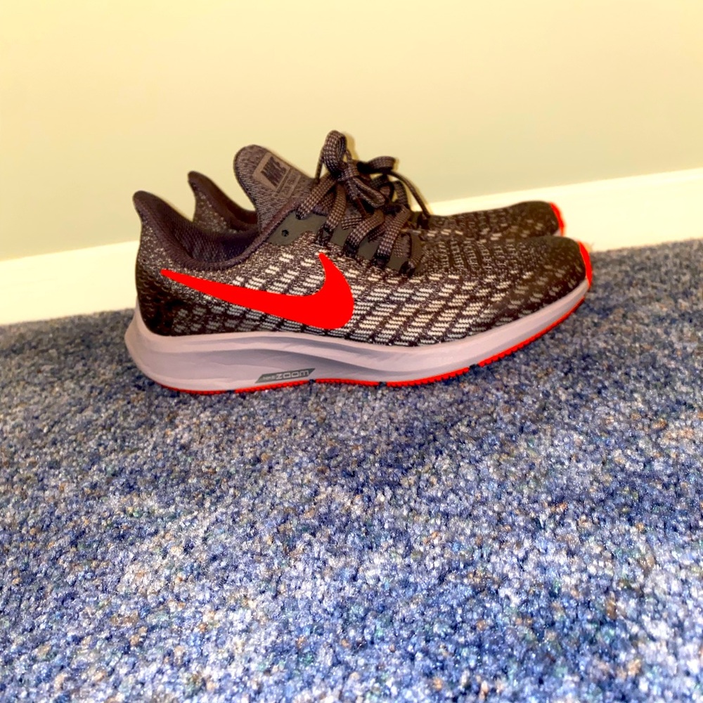 Brand new, never worn Nike zooms. Kids size 4.